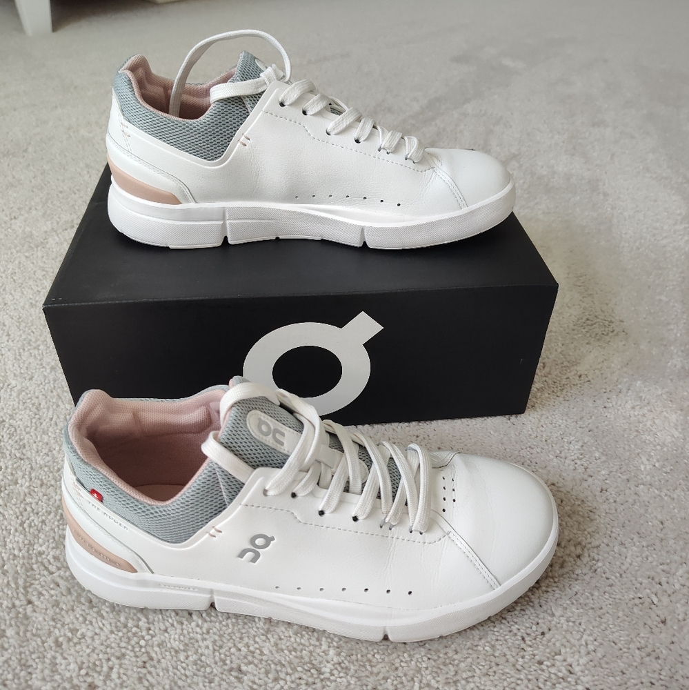 On tennis shoes, The Roger, size 8 white